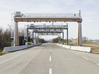 Multiple gantries and equipment viewed from street level