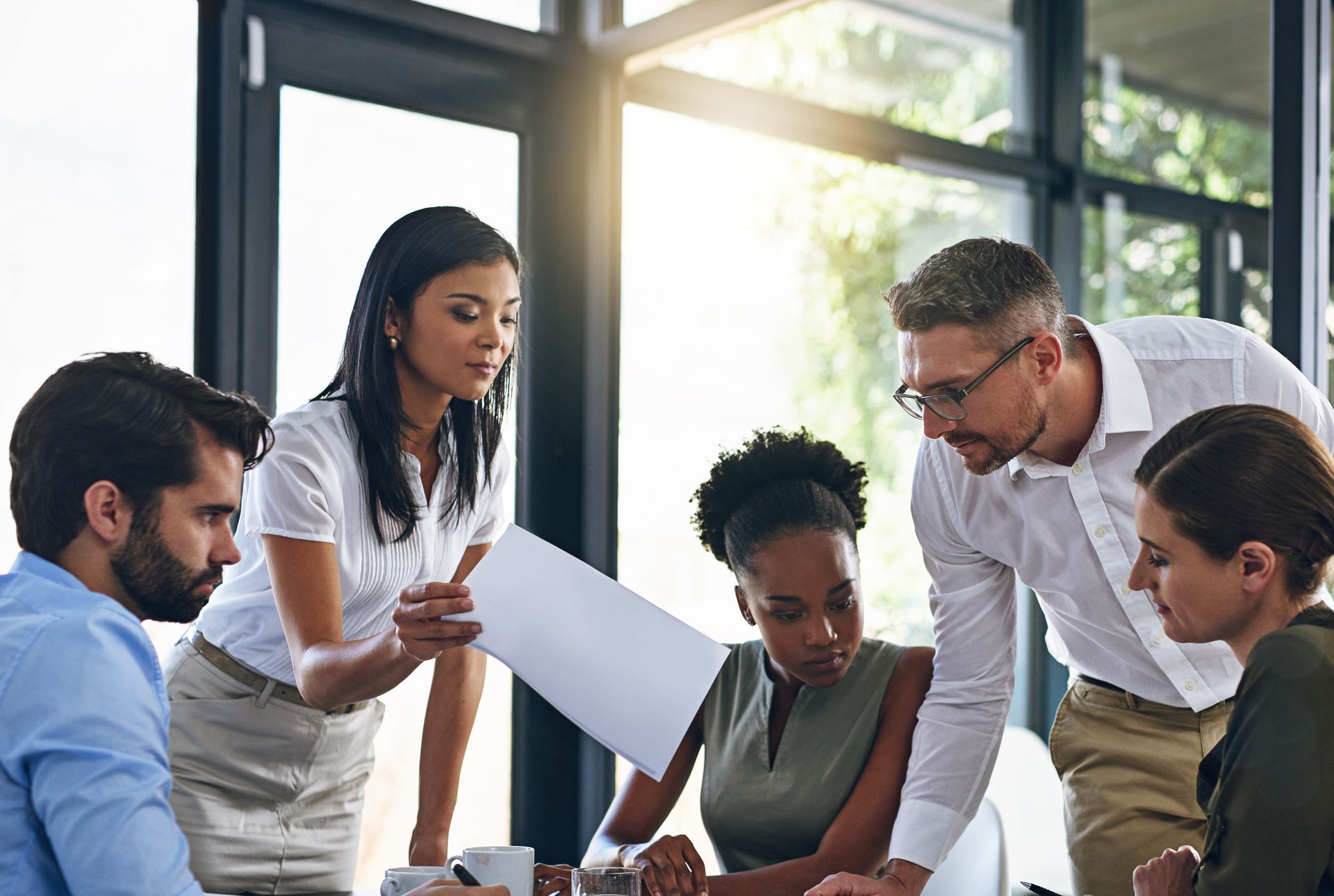 A group of people in a meeting