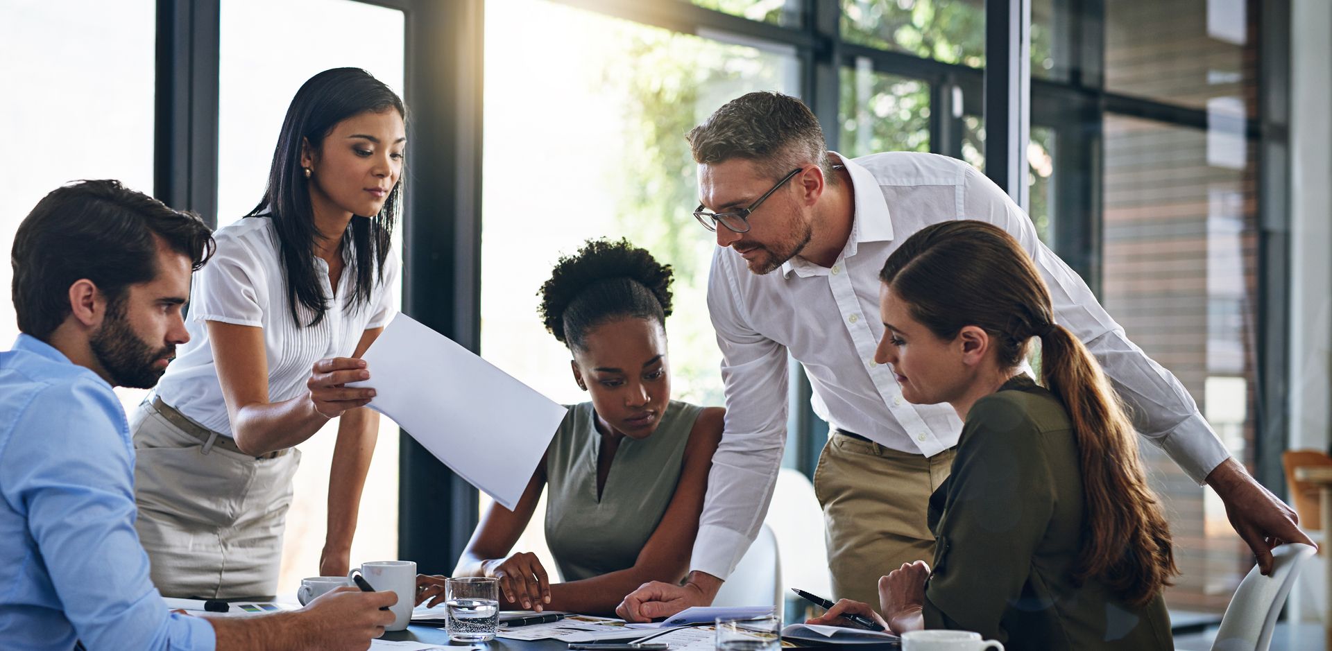 A group of people in a meeting