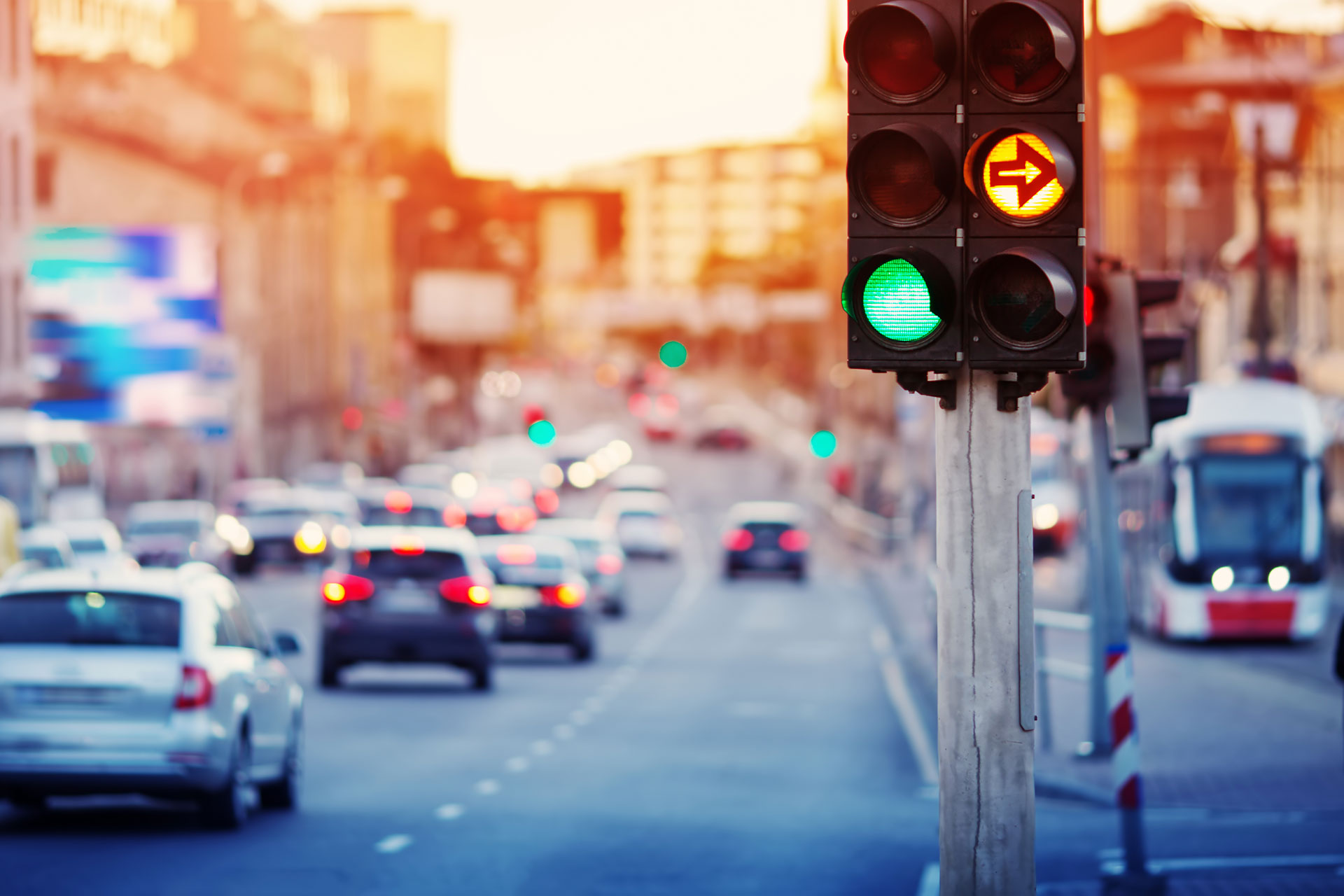 Cars moving in city with traffic lights