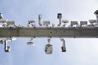 Tolling and traffic management equipment mounted on a gantry