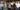 Eine Gruppe von Menschen lächelt und posiert für ein Foto.