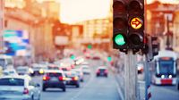 Cars moving in city with traffic lights