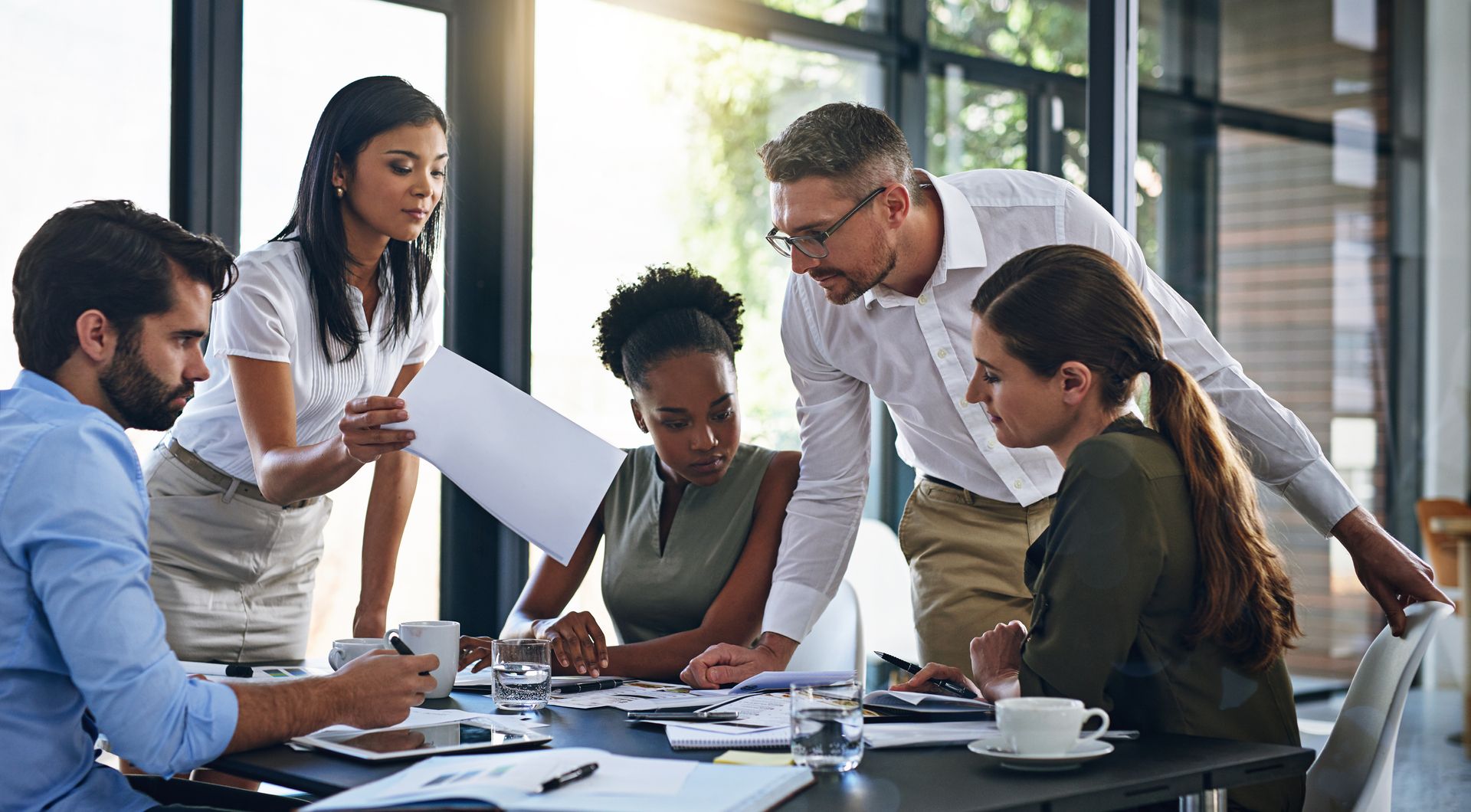 A group of people in a meeting