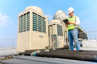 Engineer checking cooling tower
