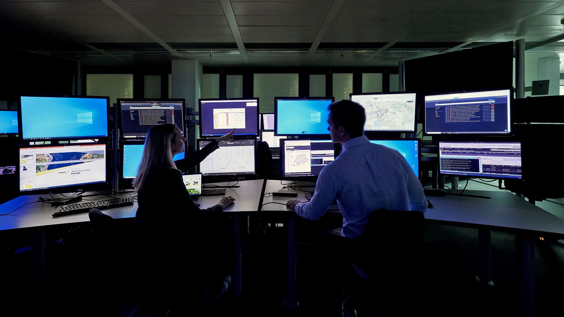 People monitoring screens