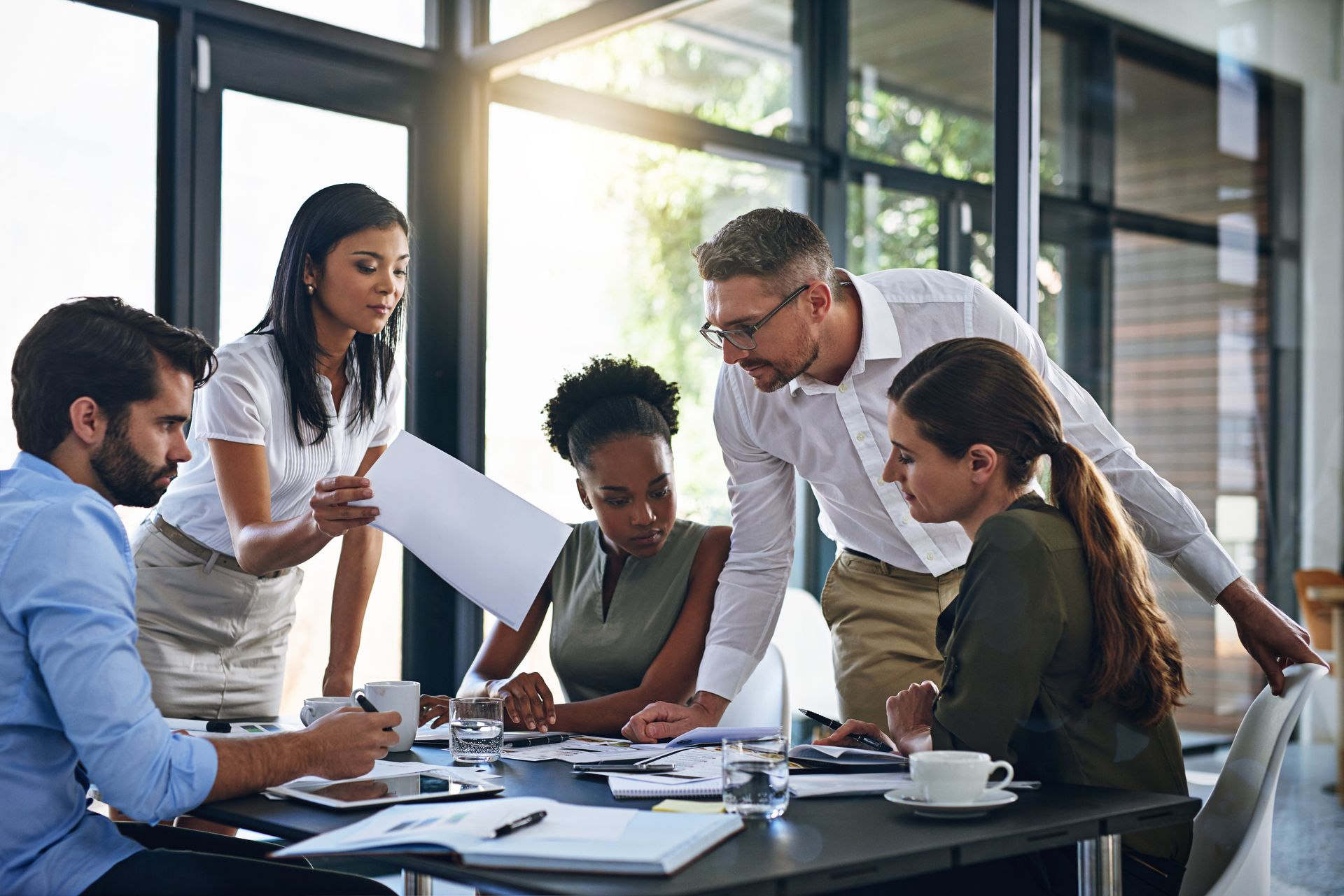 A group of people in a meeting